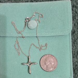 Tiffany & Co. Polished Silver Starburst Cross Necklace